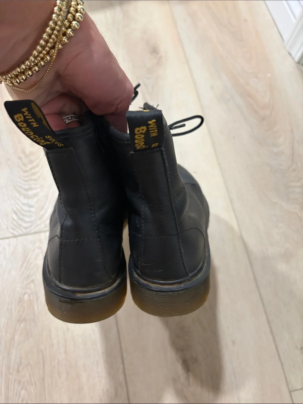 Dr. Martens Black Leather Kids Lace-Up Boots with Yellow Stitching